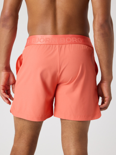 Björn Borg Shorts 6″ i orange med stretch för herr – baksida