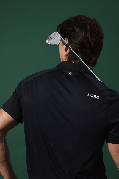 Björn Borg golfpiké i svart med mesh och stretch – baksida